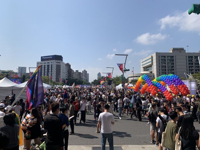 Taiwan Pride 2019 at Taipei City Hall Crowds and a rainbow balloon arch outside Taipei City Hall at Taiwan Pride 2019